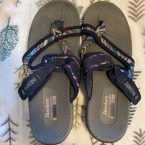 Lightly worn sketcher sandals